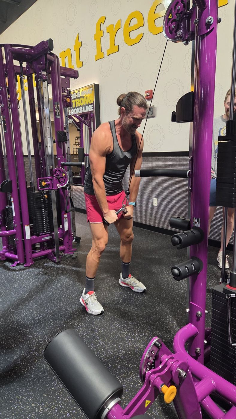 Coach Matt Breeden doing a cable strength exercise